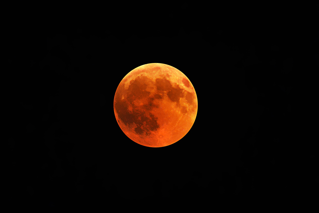 beautiful-shot-of-a-red-moon-with-a-black-night-sky.jpg